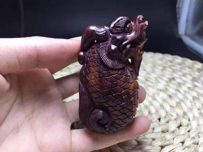 龍魚(yú)手把件寓意和象征：龍魚(yú)手把件的寓意和象征 龍魚(yú)百科 第2張